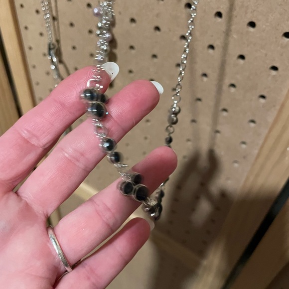 Short silver necklace with Mickey Mouse shape design clusters. - Picture 4 of 4